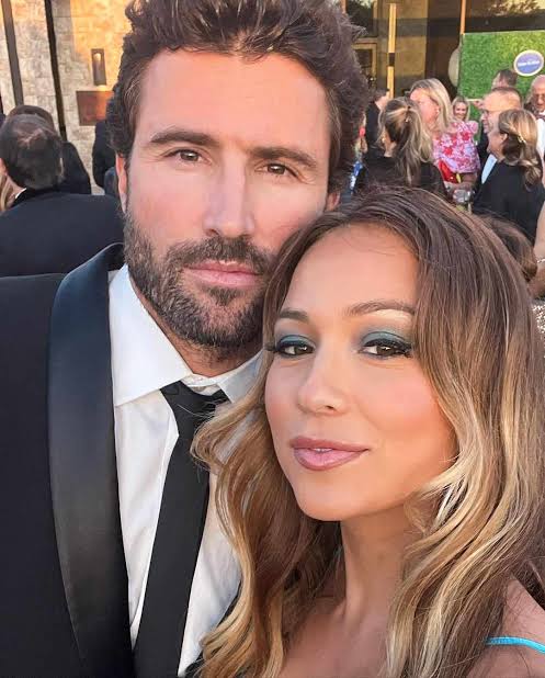 Who Is Brody Jenner's Wife? All About Tia Blanco
Introduction

Brody Jenner wife is Tia Blanco, an American professional surfer born on May 5, 1997, in Puerto Rico.

Brody Jenner is an American television personality, model, and entrepreneur best known for appearing on The Hills, Keeping Up with the Kardashians, and other reality television shows. Over the years, his personal life has often made headlines, especially his relationships and marriage.

The topic of Brody Jenner wife has attracted significant attention since he married professional surfer Tia Blanco. Their love story, engagement, beautiful wedding, and growing family have made them one of Hollywood's most talked-about couples. This article explores everything you need to know about Tia Blanco, including her early life, surfing career, relationship with Brody Jenner, wedding details, children, social media presence, and other fascinating facts.

Who Is Tia Blanco? | Brody Jenner Wife

Tia Blanco is a professional surfer, social media personality, and wellness advocate. She was born on May 5, 1997, in Puerto Rico, before growing up in Southern California. She holds American nationality and developed a passion for surfing from an early age thanks to the beaches surrounding her childhood home.

Blanco comes from a supportive family that encouraged her athletic pursuits. She quickly established herself as one of America's brightest young surfing talents. Her disciplined lifestyle, vegan diet, and commitment to fitness helped her excel in competitive surfing.

Although much of her education remained private, Tia balanced academics with an intensive surfing schedule throughout her teenage years. Her dedication eventually led to national and international success.

Outside surfing, Tia has become well known for promoting healthy living, yoga, meditation, and environmentally conscious choices. She frequently shares wellness advice with her millions of followers and collaborates with brands that align with her healthy lifestyle.

Today, many fans know her not only as Brody Jenner wife but also as an accomplished athlete with her own successful career.

Tia Blanco's Career & Professional Life

Tia Blanco began surfing competitively at a very young age and soon became one of America's top female surfers.

Her biggest breakthrough came when she won the International Surfing Association (ISA) Open Women's World Surfing Championship in both 2015 and 2016, becoming a two-time world champion. These victories established her reputation as one of the best amateur surfers in the world.

Beyond competitive surfing, Blanco has expanded her career into lifestyle influencing. She regularly partners with fitness, swimwear, wellness, and eco-friendly brands while sharing workout routines, surfing adventures, healthy recipes, and travel experiences across social media.

She also promotes animal welfare and follows a plant-based lifestyle, inspiring many followers interested in sustainable living.

Although her exact wealth is not publicly confirmed, industry estimates place Tia Blanco's net worth at approximately $1–3 million, earned through surfing competitions, endorsements, sponsorships, and digital content creation.

Her independent success demonstrates that she has built an impressive career beyond being recognized as Brody Jenner's spouse.

How Did Brody Jenner and Tia Blanco Meet?

Brody Jenner and Tia Blanco reportedly began dating in 2022 after being introduced through mutual friends. Their relationship developed naturally through shared interests, particularly fitness, travel, outdoor adventures, and healthy living.

Unlike many celebrity couples, they largely avoided unnecessary drama and instead shared glimpses of their romance on Instagram. Fans appreciated their relaxed lifestyle filled with beach trips, surfing sessions, hiking adventures, and vacations.

In January 2023, the couple announced they were expecting their first child together. Just a few months later, Brody proposed during their baby shower celebration surrounded by family and friends, creating a memorable engagement story.

Their engagement received widespread media attention because it marked an important new chapter in Brody's life after previous high-profile relationships.

The couple consistently demonstrated their strong partnership while preparing for parenthood, with Tia supporting Brody's career and Brody embracing family life.

Their relationship quickly became one of Hollywood's favorite modern love stories.

Brody Jenner and Tia Blanco Marriage & Wedding Details

Brody Jenner and Tia Blanco officially married in July 2025 in an intimate ceremony attended by family members and close friends.

The wedding reflected the couple's relaxed personalities with elegant décor, beautiful outdoor scenery, and heartfelt vows celebrating their journey together.

The ceremony also represented a meaningful milestone for Brody, whose previous relationship with Kaitlynn Carter included a symbolic overseas ceremony that was never legally recognized as a marriage.

Family members, including several members of the extended Jenner family, celebrated the special occasion alongside close friends.

Since their wedding, Brody and Tia have continued sharing glimpses of married life through social media while maintaining a healthy balance between public appearances and private family moments.

Their marriage marked the beginning of an exciting new chapter built around love, family, and shared values.

Children & Family Life

Brody Jenner and Tia Blanco welcomed their first child, daughter Honey Raye Jenner, in July 2023.

Parenthood has become a central part of their lives. Brody frequently speaks about how becoming a father changed his outlook, while Tia often shares adorable family moments with their daughter.

The couple enjoys spending quality time outdoors, introducing Honey to nature, beaches, and family adventures from an early age.

Despite their celebrity status, Brody and Tia strive to protect their daughter's privacy while occasionally sharing joyful milestones with fans.

Their parenting style emphasizes health, positivity, and spending meaningful time together, making them one of entertainment's most admired young families.

Tia Blanco on Social Media

Tia Blanco has built an impressive social media following, particularly on Instagram, where she has more than 700,000 followers.

Her content focuses on:

Surfing adventures
Yoga and fitness
Healthy recipes
Vegan lifestyle
Family moments
Travel photography
Wellness inspiration

She also shares updates featuring Brody Jenner and their daughter, giving followers a glimpse into their everyday family life while maintaining authenticity.

Quick Facts About Brody Jenner Wife
Detail	Information
Full Name	Tia Blanco
Date of Birth	May 5, 1997
Nationality	American
Profession	Professional Surfer, Influencer
Married to	Brody Jenner
Marriage Year	2025
Children	Honey Raye Jenner
Estimated Net Worth	Approximately $1–3 Million
FAQ About Brody Jenner Wife
Q: What is Brody Jenner's wife name?

A: Brody Jenner's wife is Tia Blanco, a professional surfer and social media personality. They married in July 2025.

Q: How old is Tia Blanco?

A: Tia Blanco was born on May 5, 1997. Her age depends on the current date.

Q: What does Tia Blanco do for a living?

A: Tia Blanco is a professional surfer, two-time ISA World Surfing Champion, wellness influencer, and entrepreneur.

Q: When did Brody Jenner and Tia Blanco get married?

A: The couple married in July 2025 after becoming engaged during their baby shower in 2023.

Q: How many kids do Brody Jenner and Tia Blanco have?

A: They have one daughter, Honey Raye Jenner, who was born in July 2023.

Conclusion

brody jenner wife
